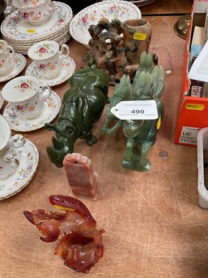 Lot 490 - Group of soapstone, green hard stone and other carvings.