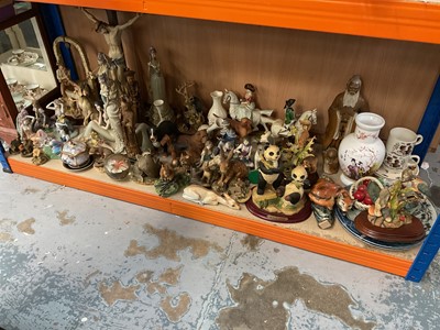 Lot 90A - Large group of predominantly resin ornaments and figures including dogs, fairies and others.