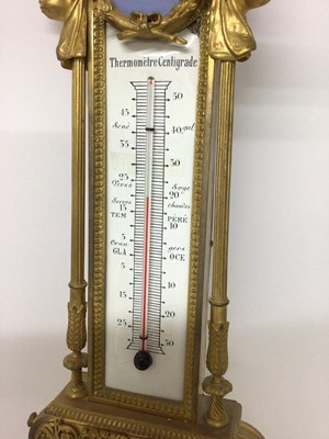 Lot 710 - Ornate 19th century French ormolu and porcelain mounted barometer, later painted dial, signed Thierry a Paris