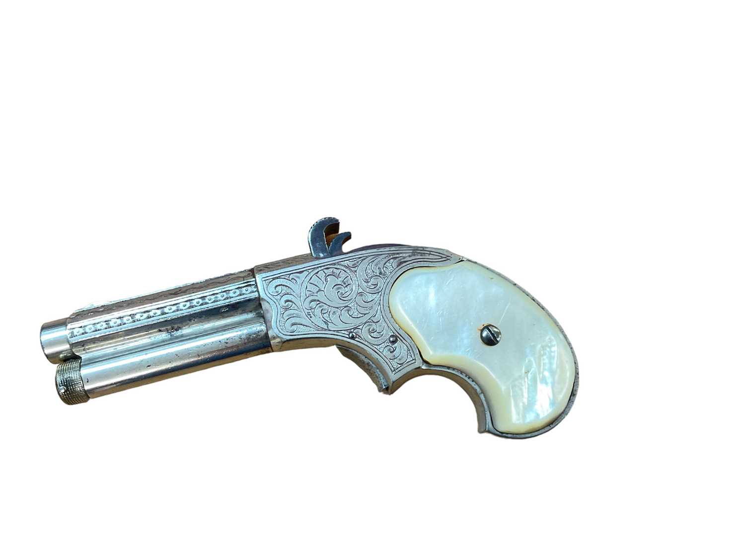 Lot 1002 - Scarce Remington Rider 1871 Patent rim fire derringer pistol with mother of pearl grip