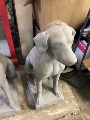 Lot 1490 - Pair of grey painted concrete garden statues of dogs, 75cm high
