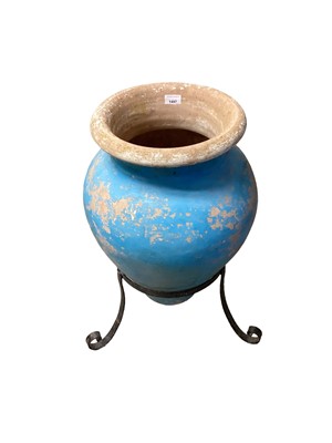 Lot 1497 - Painted terracotta Amphora shape garden pot on iron stand, 69cm high and another