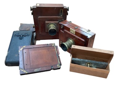 Lot 2356 - Victorian plate camera in brown leather box retailed by The London Stereoscopic & Photographic Co. Together with other cameras