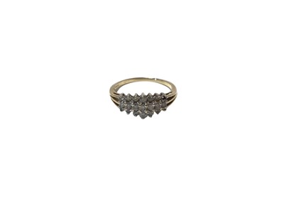 Lot 555 - Diamond cluster ring in 9ct gold setting