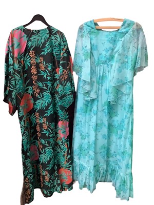 Lot 2083 - 1970s evening dresses including oriental inspired printed chiffon by California, floaty pale blue angel wing chifforn dress, blue and silver column dress, beaded green satin gown by Marjon Coutur...