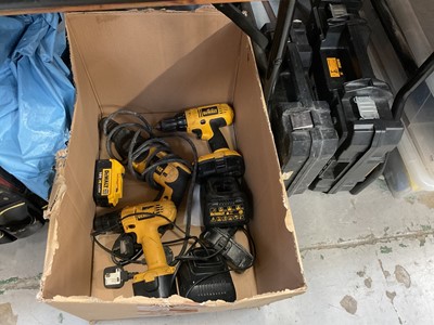 Lot 763 - Two DeWalt cordless drills and another DeWalt drill.