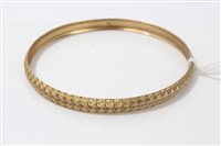 Lot 3205 - Gold (9ct) bangle, approximately 6.8cm diameter