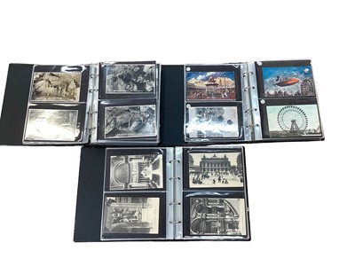 Lot 1439 - Postcards in three albums including ferris wheels, royalty, topography, Torquay, overseas etc.