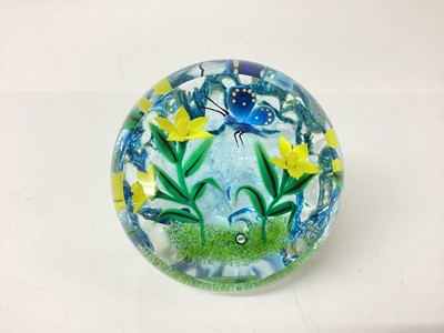 Lot 1249 - William Manson Snr glass paperweight, signed, daffodils with blue butterfly