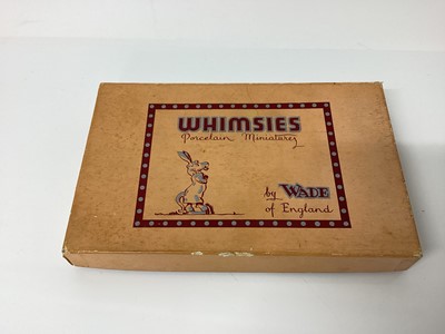 Lot 1252 - Collection of Wade Whimsies and other Wade figures to include Sooty and Sweep, three 1950s boxed first whimsies