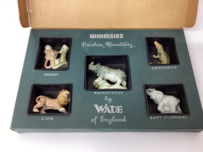 Lot 1252 - Collection of Wade Whimsies and other Wade figures to include Sooty and Sweep, three 1950s boxed first whimsies