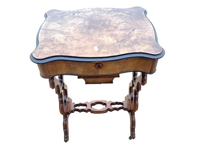 Lot 1268 - Victorian walnut sewing table