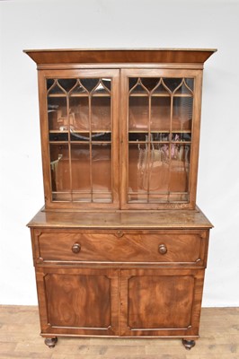 Lot 1386 - Early Victorian mahogany two height secretaire bookcase