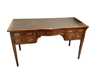 Lot 1287 - Edwardian mahogany writing table with five drawers and leather lined top