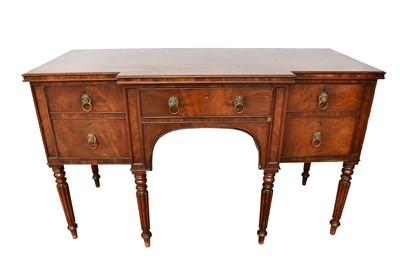 Lot 1391 - William IV mahogany breakfront sideboard with an arrangement of drawers, on turned and fluted legs