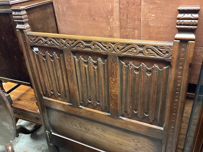 Lot 1293 - Early 20th century carved oak single bedstead with linen fold panels