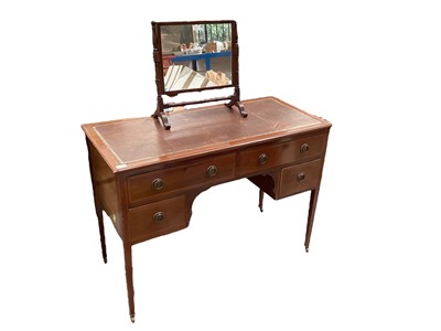 Lot 1272 - Edwardian mahogany writing table/dressing table with swing toilet mirror