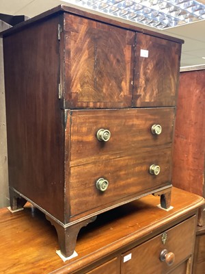 Lot 1379 - George III mahogany commode chest on bracket feet