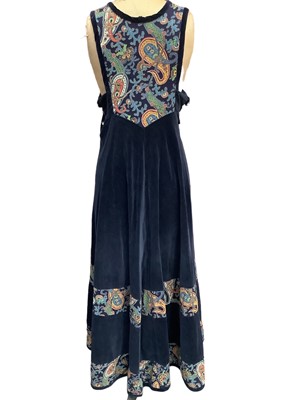 Lot 2098 - 1970s designer Anna Belinda handmade Oxford navy velvet and flora print pinafore maxi dress