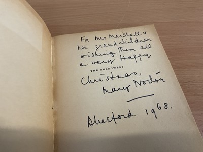 Lot 1704 - Mary Norton - The Borrowers, early edition 1953, signed and dedicated by the author, together with a hand signed Dutch edition and also five postcards from the author. Provenance: by family descent...