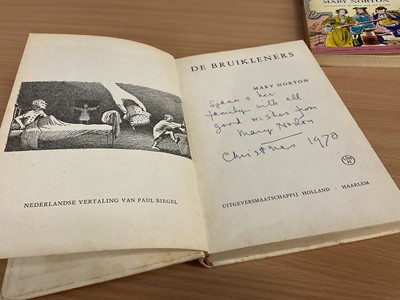 Lot 1704 - Mary Norton - The Borrowers, early edition 1953, signed and dedicated by the author, together with a hand signed Dutch edition and also five postcards from the author. Provenance: by family descent...