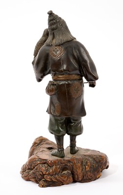 Lot 816 - Japanese Meiji period bronze figure of a falconer