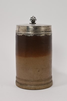 Lot 56 - Large Georgian stoneware salt glaze 2 1/2 pint tankard with silver hinged lid