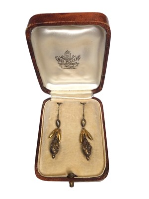 Lot 223 - Pair of Victorian yellow metal earrings in fitted box