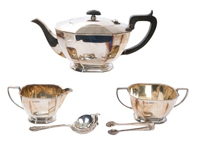 Lot 259 - Silver three piece tea set with a tea strainer and sugar tongs