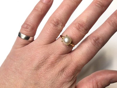 Lot 58 - 18ct gold single stone cultured pearl ring in four claw setting, size L