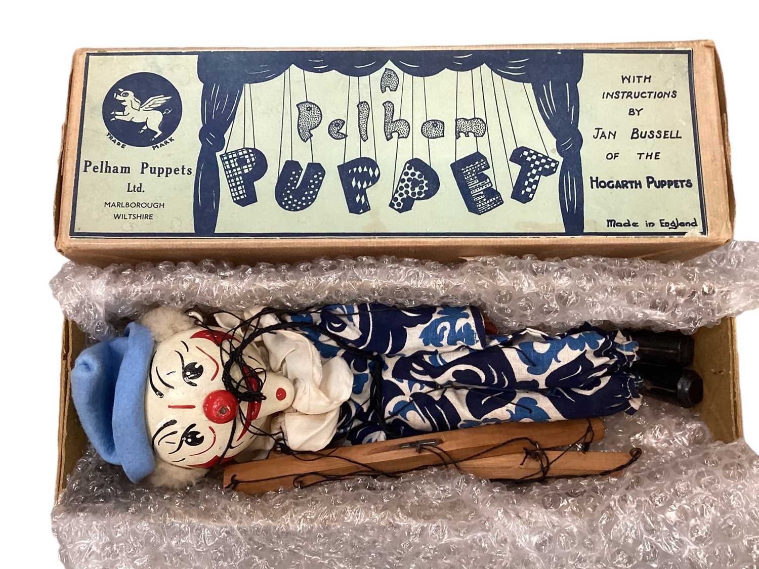 Lot 1915 - A rare Pelham Puppet SM white faced clown, in original card box