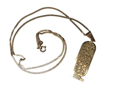 Lot 74 - Egyptian yellow metal pendant on 18ct gold chain
