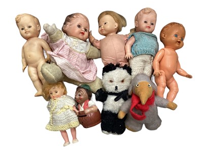 Lot 1923 - Small toys 1950s and later. including newborn doll, soft rubber dolls, Palitoy doll, mohair panda bear, Pedigree Wombly.