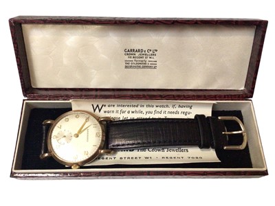 Lot 83 - 1950s Garrard 9ct gold cased wristwatch on leather strap, in orginal box