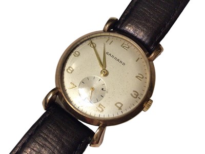 Lot 83 - 1950s Garrard 9ct gold cased wristwatch on leather strap, in orginal box