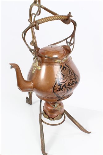 Lot 724 - German Art Nouveau copper and brass kettle on...