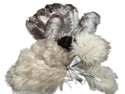 Lot 2106 - Three Ostrich feather fans plus one other.
