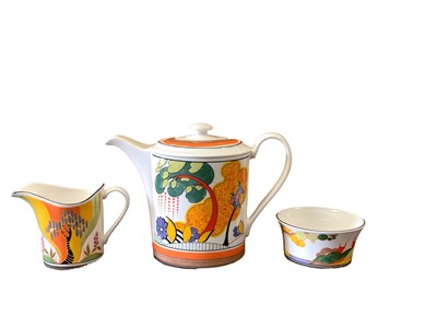 Lot 1206 - Wedgwood Clarice Cliff limited edition Cornwall teapot, together with Windbells milk jug and a Secrets sugar bowl (3)