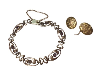Lot 101 - Edwardian 9ct gold open work gem set bracelet and one 15ct gold cufflink