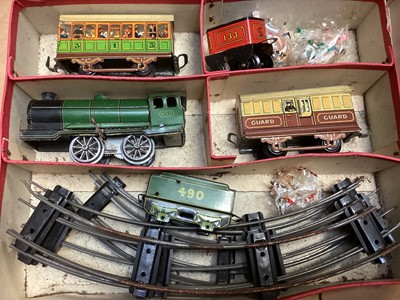 Lot 1963 - Three tin plate clockwork train sets (3)