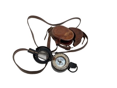 Lot 715 - Second World War British Army Officer's Prismatic Compass in black painted finish, stamped E. R. Watts & Son, No. 2930 1938 MK III, with an associated leather case.