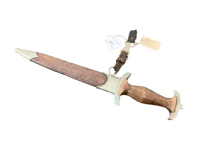 Lot 931 - Nazi SA man's dagger with etched blade by E.P.&S. Solingen retaining all original polish with scabbard and original hanger with belt loop. A sleeper with label saying it was exchanged for cigarette...