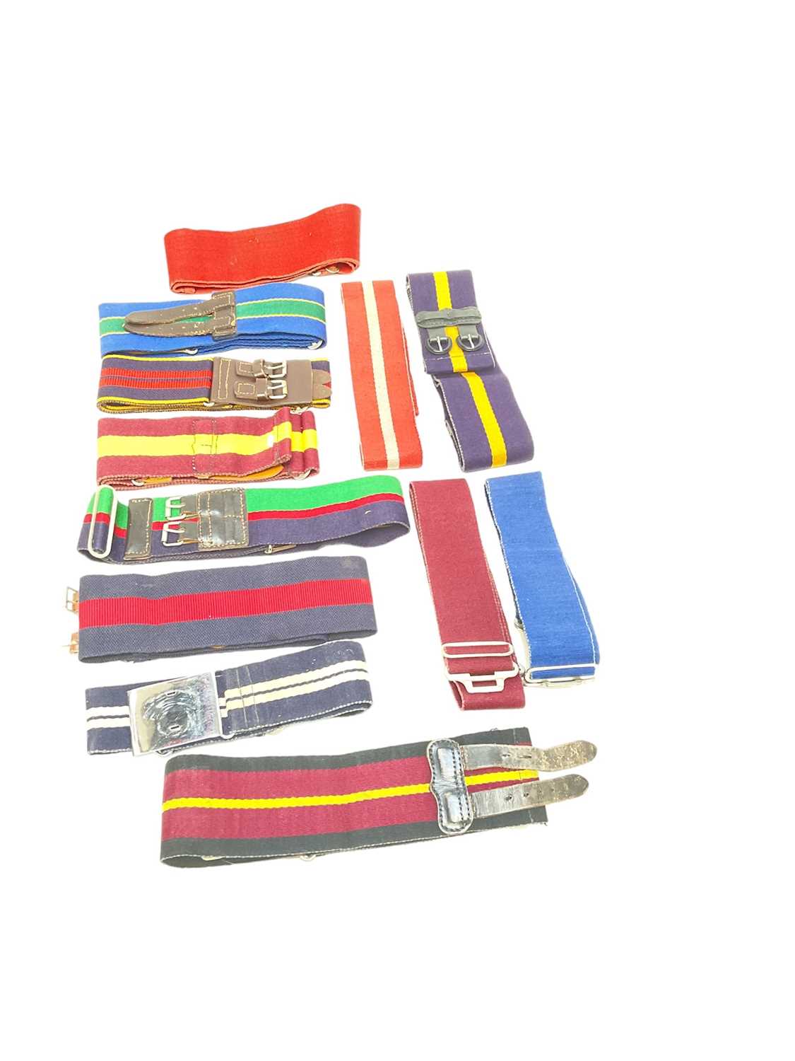 Lot 758 - Collection of British military stable belts to include Royal Logistics Corps and The King's Own Border Regiment (12)