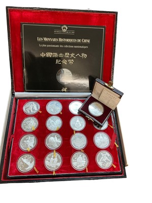 Lot 499 - China - A cased numismatic collection of thirty two silver proof 5 Yuan coins 1987