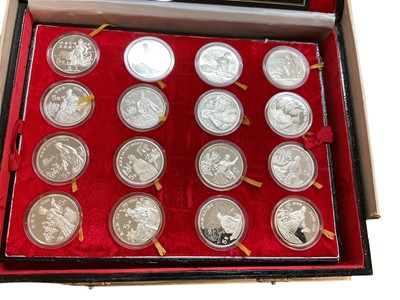 Lot 499 - China - A cased numismatic collection of thirty two silver proof 5 Yuan coins 1987