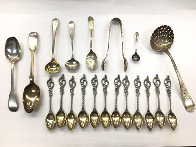 Lot 1069 - Group of silver and white metal spoons and pair of silver sugar tongs, in a brass inlaid box