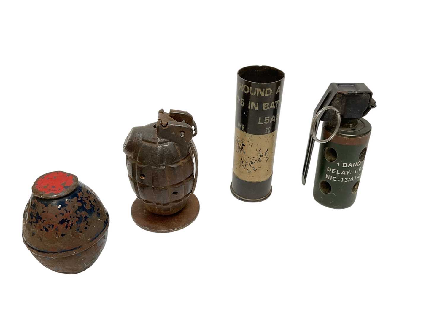 Lot 802 - Mills bomb grenade converted into a desk weight together with dummy / training grenades and a rubber bullet (4).