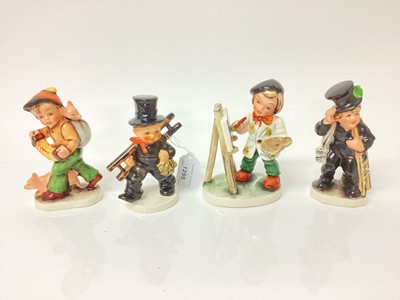 Lot 1255 - Seven German Friedel figures, all boxed together with a Hummel figure (8)