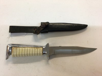 Lot 944 - German Hunting knife with polished steel blade by Ern Wald, Solingen and ribbed plastic grip, in leather sheath.