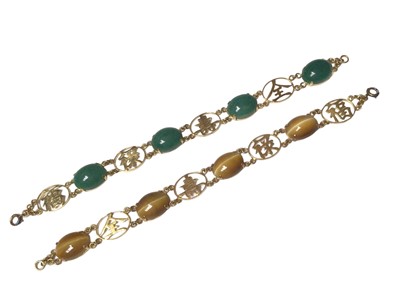 Lot 165 - Two Chinese 14ct gold hard stone and character mark panel bracelets, both 18.5cm long